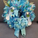 Flip flop wreath • Locally made wreaths, this one highlighting flip flops with beautiful beachy colors.