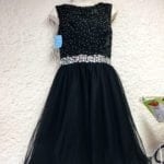 Short Black Party Dress • Sleeveless black with sequins and tulle skirt. This little dress makes you feel beautiful. Size 8