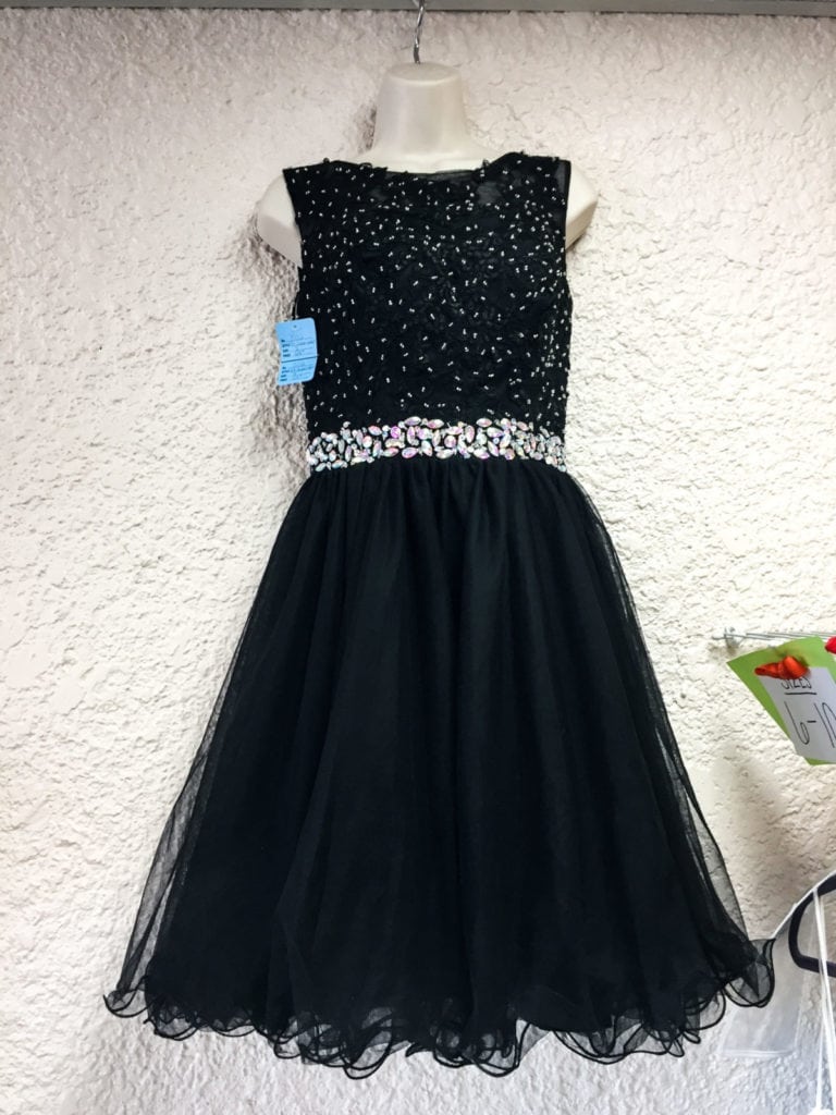 Short Black Party Dress • Sleeveless black with sequins and tulle skirt. This little dress makes you feel beautiful. Size 8