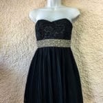 Black Strapless Party Dress • Beautiful black, strapless party dress with rhinestone waistline. This dress is adorable on and will be noticed by all. Size 6