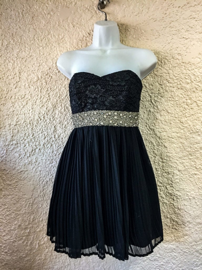 Black Strapless Party Dress • Beautiful black, strapless party dress with rhinestone waistline. This dress is adorable on and will be noticed by all. Size 6
