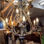 Unique Chandelier • This lovely vintage chandelier is artistically decorated with touches of 100 year old glass. This one of a kind piece will add elegance to any dining room. A must see!