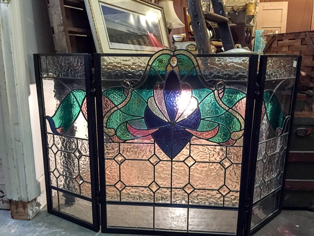 Vintage Stained Glass Screen • You will be the envy of other fireplace owners with this handcrafted stained glass screen! Black outline with brilliant emerald green, cobalt blue & rose. A photo doesn't do this beauty justice. Please come and ask to see this stained glass screen.