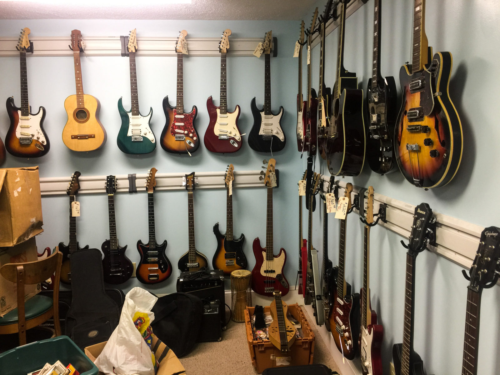 Guitars And Musical Instruments •