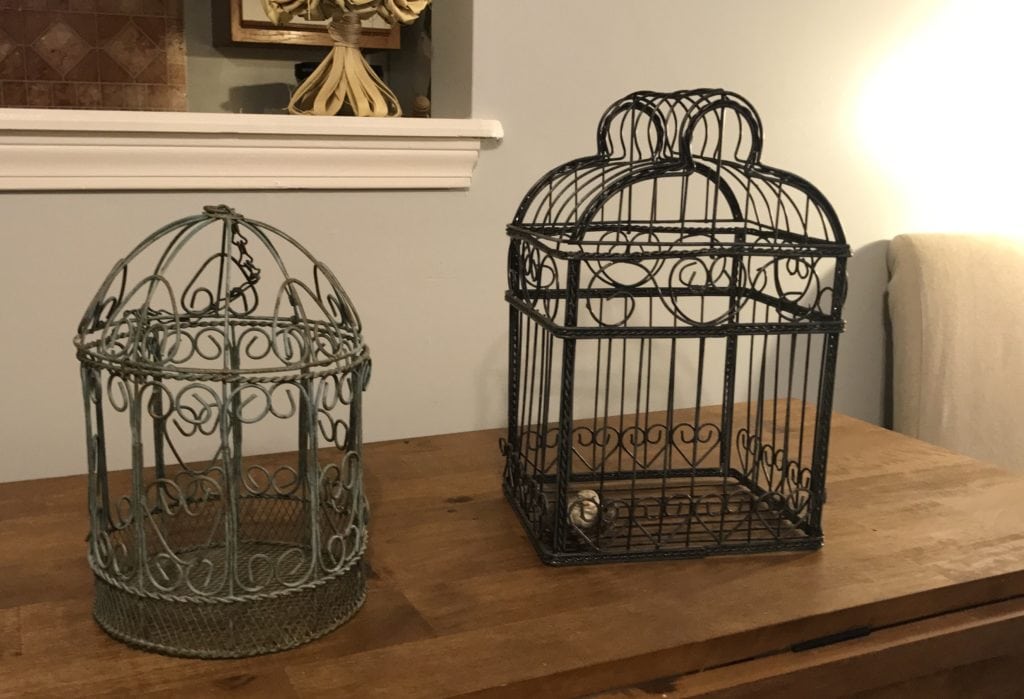 Vintage decorative birdcages • Decorative birdcages. One with a hanging chain and one with a bird in birds nest inside. Add some wintery greenery and they'd be perfect in your seasonal decor!