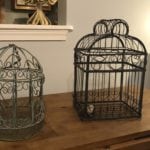 Vintage decorative birdcages • Decorative birdcages. One with a hanging chain and one with a bird in birds nest inside. Add some wintery greenery and they'd be perfect in your seasonal decor!