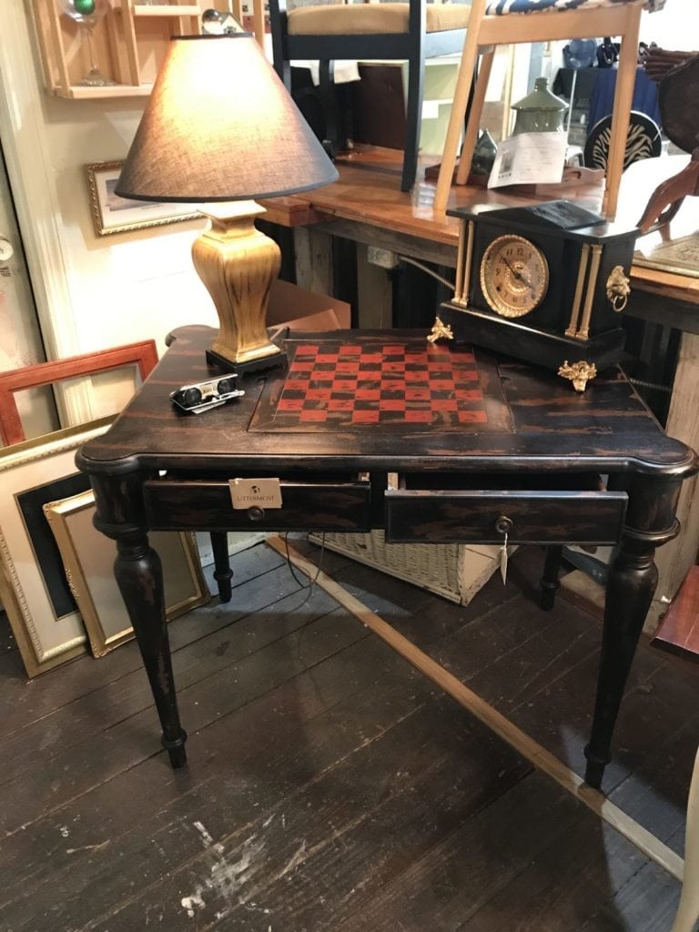 New with tags game table • Uttermost Game Table. New with Tags. Reverses from Chess/Checkers to Backgammon. Has four drawers to store game pieces and other accessories. Great accent piece that's also FUNctional! This table would add to any decor!