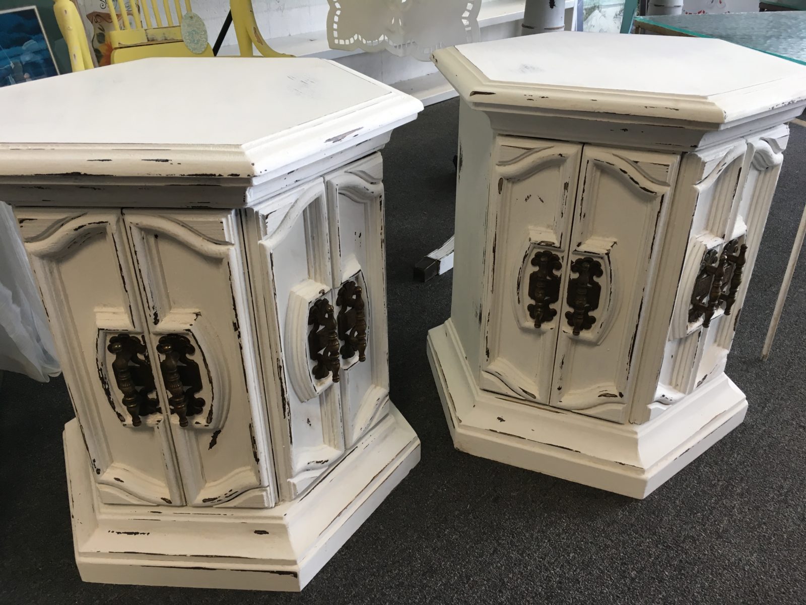 Chalk Paint End Tables • Very unique chalk painted matching hexagon tables, perfect for a unique spin on night stands or living room end tables. Original decorative hardware with storage underneath.