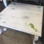 Coastal Coffee Table • What a fun and whimsical table for your beach house or family room, this square coffee table is painted with white chalk paint and lightly distressed and just for fun we've added a few starfish & seahorses!