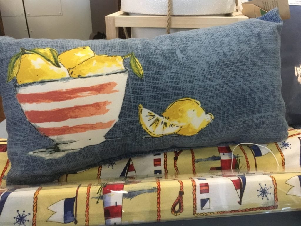 Outdoor Accent Pillow • Canvas outdoor pillow with whimsical lemons in a bowl adds a pop of color to any space, indoor or out!