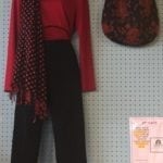 Red and black ensemble • Red long sleeve shirt, black dress pants, polka dot scarf, and red and black handbag.
