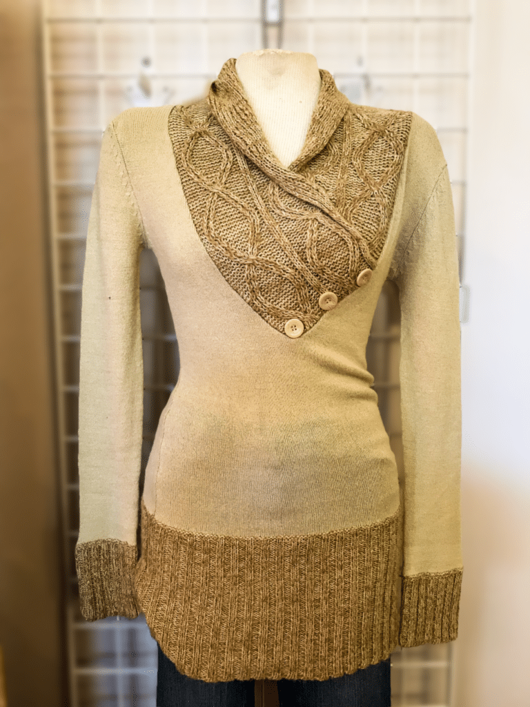 Beautful Calvin Klein Sweater • Beautiful two toned, tan sweater with stylish cuffs. V-neckline with 3 button accent. Would look great paired with dark jeans and boots.