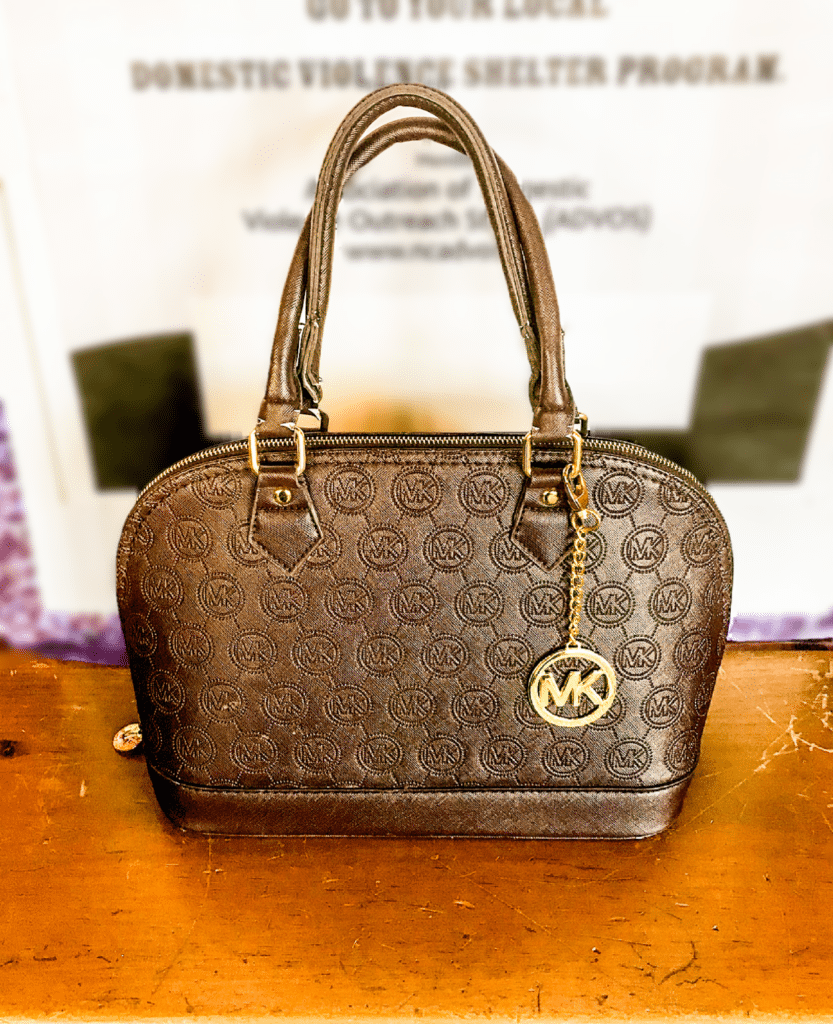 Michael Kors Handbag • Beautiful brown Michael Kors Handbag. This handbag is in very good condition and it just waiting for a new owner!