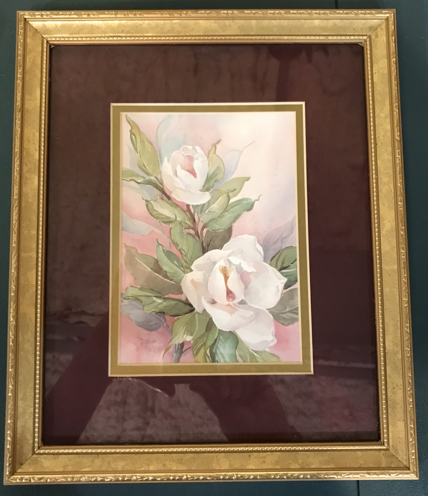 Magnolia flower print • We love magnolias! This gorgeous print is double matted in gold and cranberry and sits in a 10x12 gold frame. This lovely piece will add sweet southern charm to any decor! Come see it in person to appreciate its beauty!