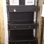 Black bookcase w/drawers •