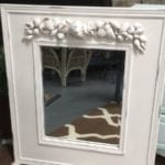 Hand Made Shell Mirror • Beveled mirror in a wooden frame accented by real sea shells chalk painted white and lightly distressed. Stunning in an entrance hall, sun room or beach house. Unique one of a kind piece...