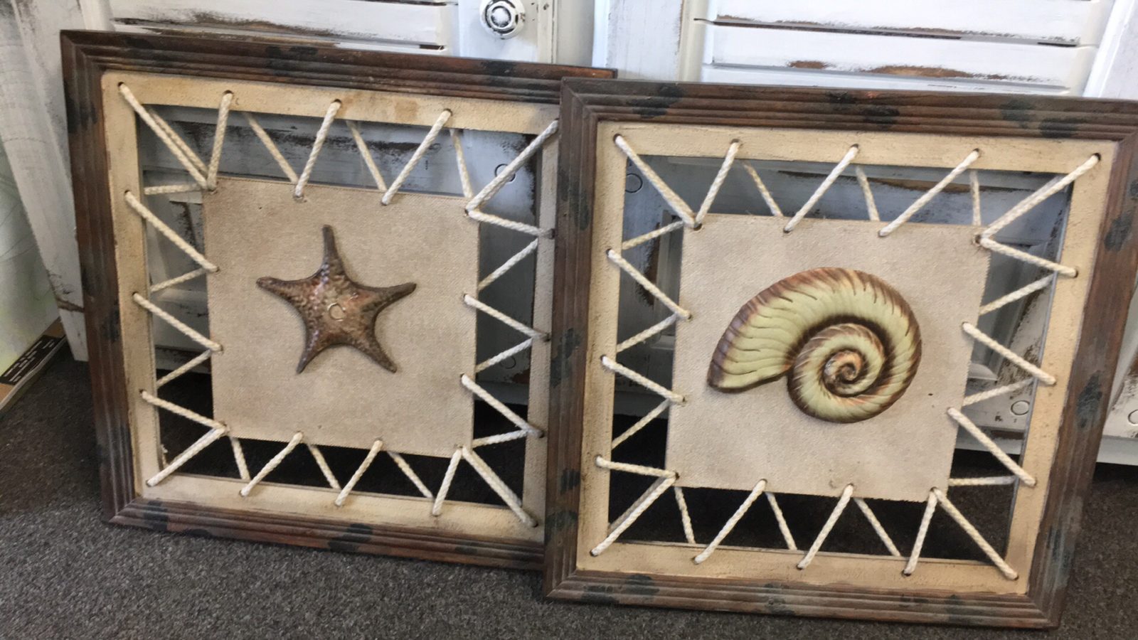 Coastal Decorative Wall Art • Very distinctive wall art/decor featuring raised coastal designs, distressed wood frames and rope detailing. Sold as a set, they would look perfect hung over a console table or bed. Bring home the beach with a touch of coastal elegance.