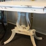 Chalk Paint Harp Table • Antique table with a unique harp design base chalk painted white and distressed. Very elegant and seldom seen design adds a wow factor to any room in your house. Stunning with a vintage lamp or as a bedside table.