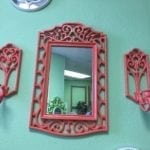 Palm Beach Mirror Set • Coral colored mirror with two matching Candleholders in a very retro Palm Beach Chic look. Add a splash of color in your dining room, entrance hall or covered porch. Add some fun prints for a vibrant beach look or pair with s mirrored dresser a glam look
