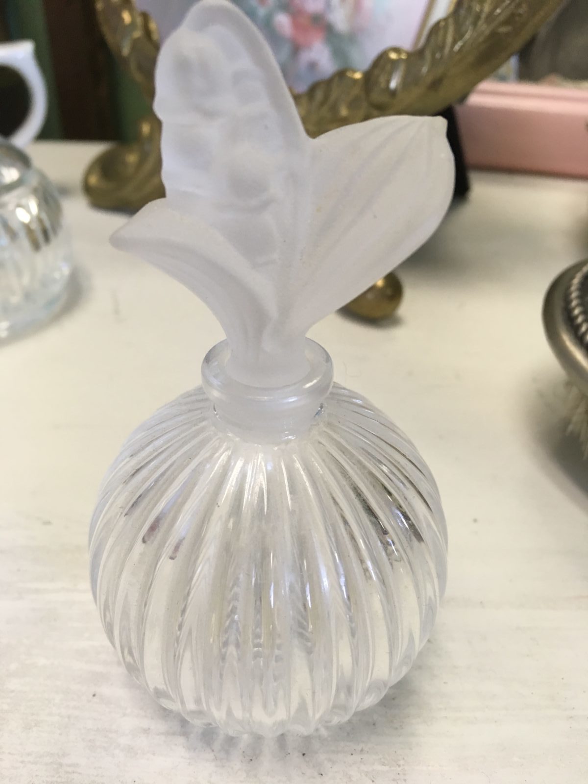 Vintage Perfume Bottle • Vintage crystal perfume bottle with a frosted crystal stopper Made in France. Beautiful on a vanity or in a bathroom or grouped with other perfume dispenser bottles.