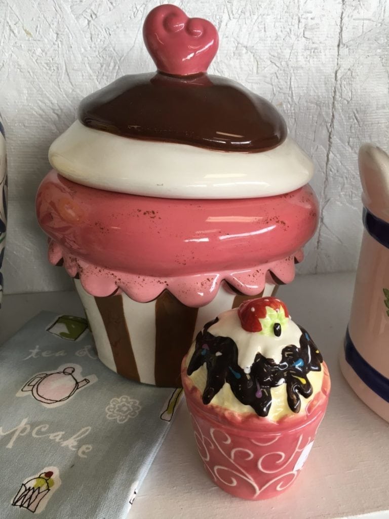 Cupcake Cookie Jar • Delicious looking ceramic cupcake cookie jar with heart shaped handle. Pair with our mini cupcake, fill with sweet treats and you have the perfect gift!