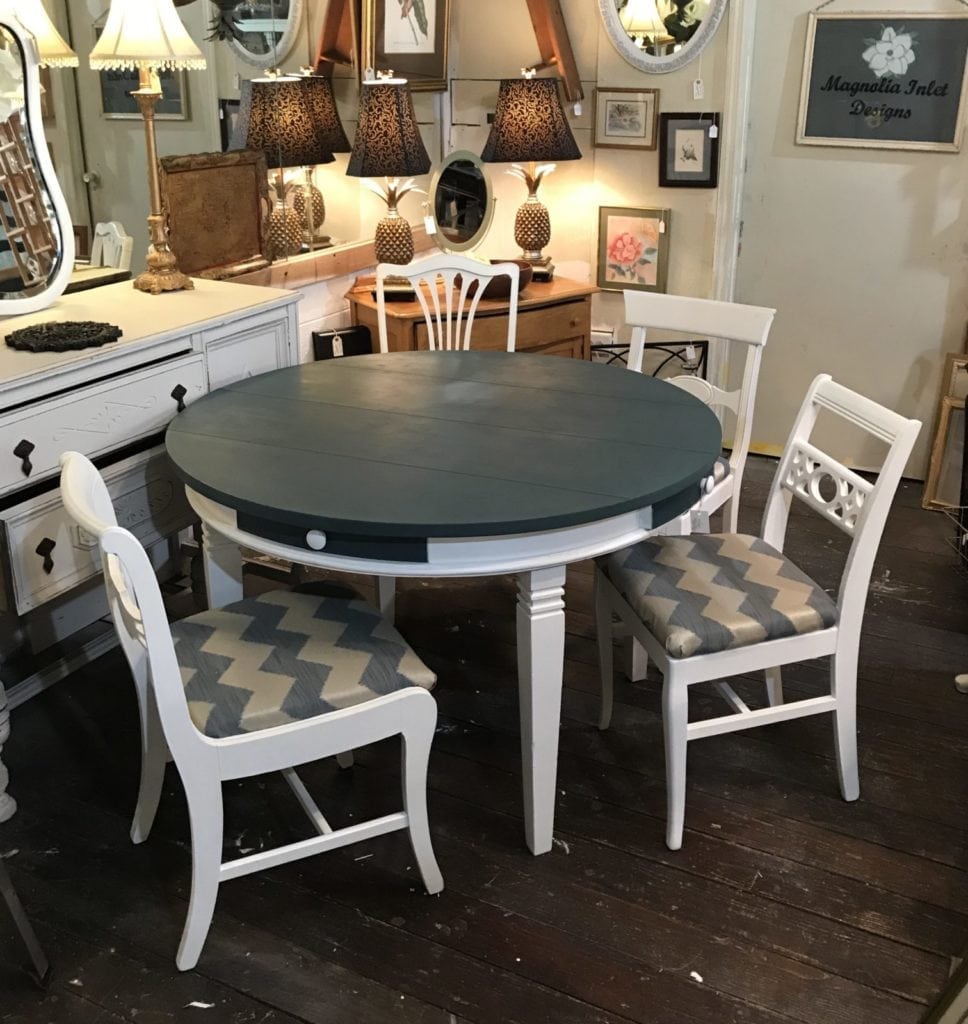 Dining table and four chairs • ReDesigned round dining table & four chairs. Each chair is unique, and coordinates beautifully with this lovely Homestead Blue and bright white. Table is large enough to seat 6. Four drawers for storage-napkins, flatware, etc.