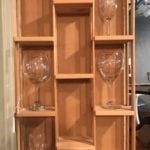 Hanging wood display shelf • Let us customize the finish fit you in this great display shelf. Here we’re using it to display wine glasses, but you can display any of your prizes here. 
Listed price does not include customization.