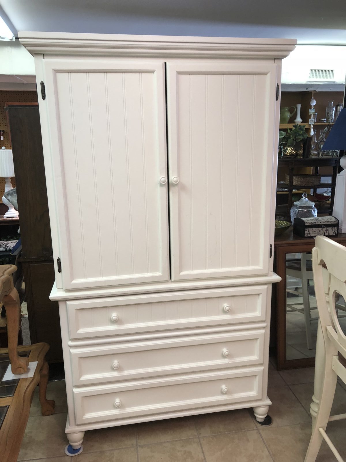Armoire/Tv Cabinet • White wood armoire/tv Cabinet in excellent condition.