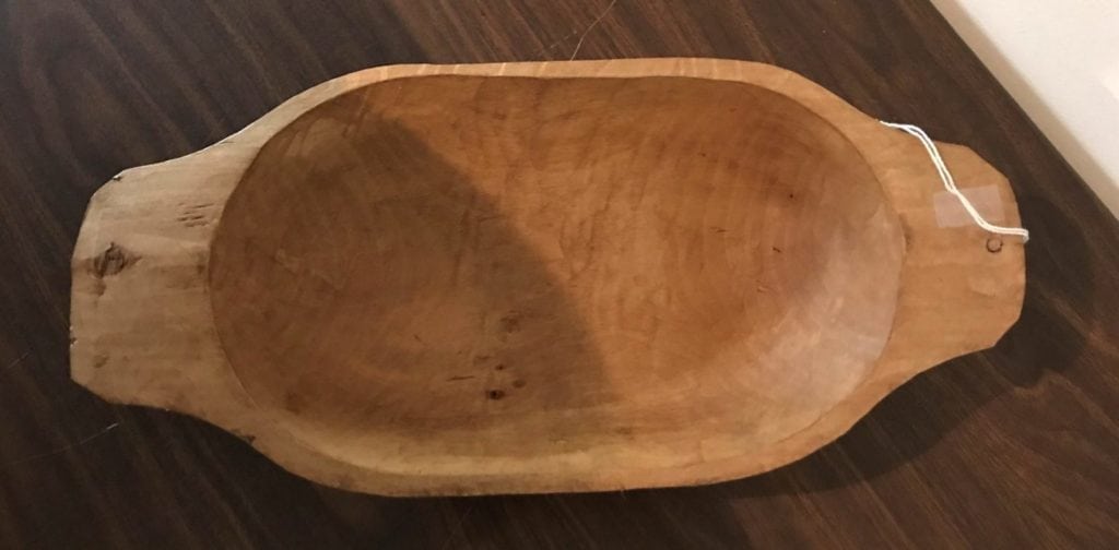 Primitive hand hewn dough bowl • This lovely wooden dough bowl is in great condition and can be used in any decor. Fill with your found sea shells, pine cones or decorative balls and make it your own! Measures 19”x9”.