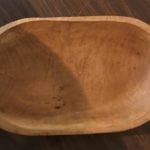 Primitive hand hewn dough bowl • This lovely wooden dough bowl is in great condition and can be used in any decor. Fill with your found sea shells, pine cones or decorative balls and make it your own! Measures 19”x9”.