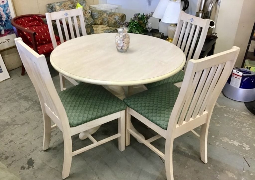 Whitewash Dinette w/4 chairs • Great buy on this very gently used whitewash dinette with four matching chairs. Seats are vinyl with no rips or tears or punctures. Top is 42" Great for apartment or condo.