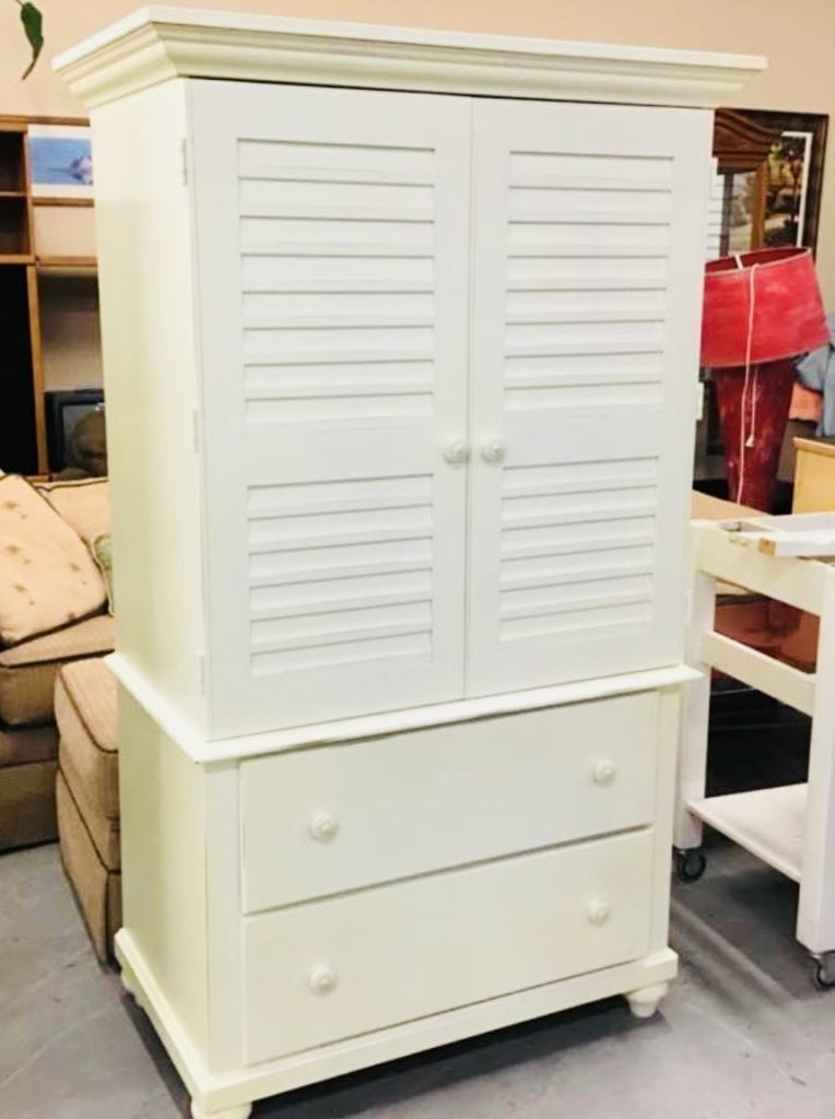 Riverside Storage Armoir/Closet • Great buy on this white riverside furniture armoire / wardrobe storage cabinet. This is in like new condition from smoke, pet and bug free home . Can be used with tv or as a wardrobe. Has mounts for clothes bar. Has adjustable shelves w 2 large Storage