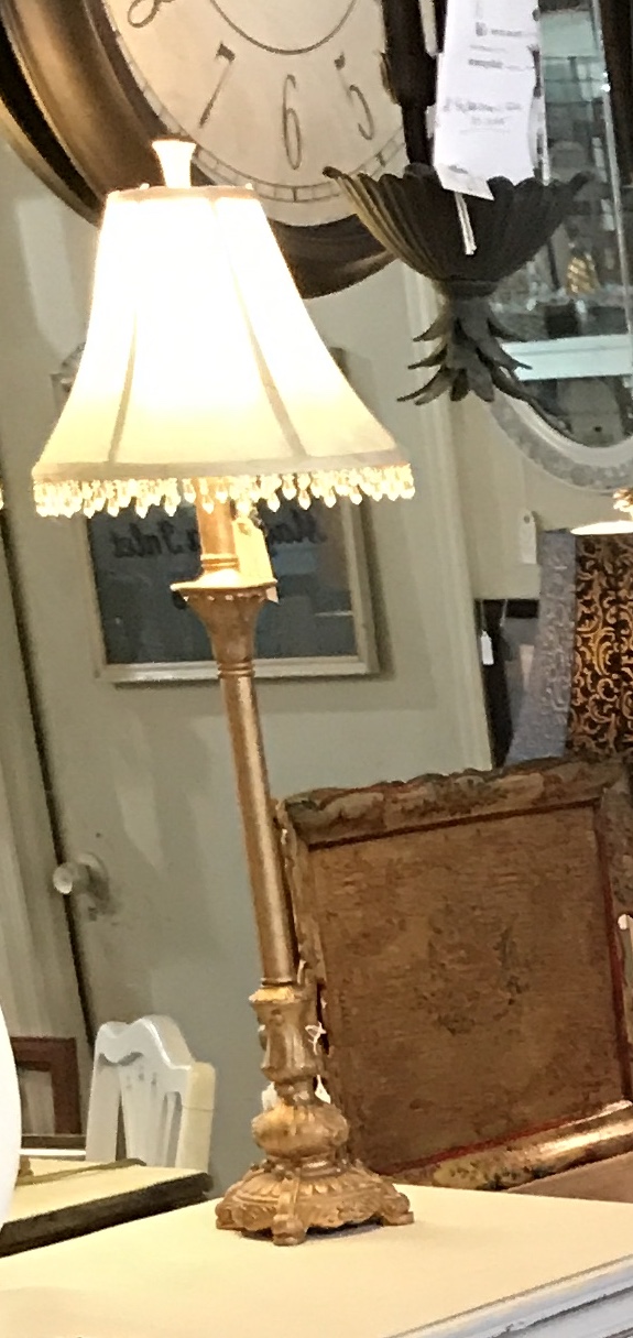 Pair of Candlestick Lamps • Goldtone Candlestick Lamps with offwhite shades accented with crystal trim. We love them on a buffet, but these heavy, well made lamps would be great anywhere. Price is for the pair.