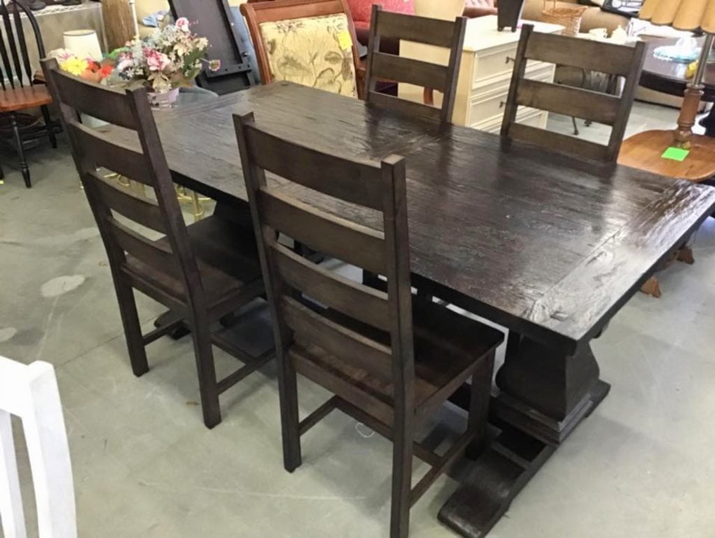WorldMarketExtensionTable4chairs • Great buy on this very gently used world market extension table with four chairs. These garner chairs run new $279.00 for two. Owner paid $558.00 for four chairs and $650 for table. Unique table design has two extensions that clip on to each end extending