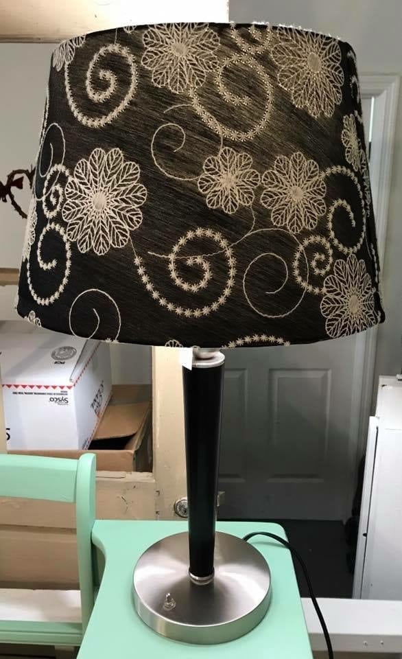 Black and Chrome Lamp • Single lamp with fabulous floral pattern stitched on the black lampshade. Grest in an office, guest bedroom or den.