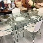 Green Metal/Wicker Table&4Chairs • Great buy on this metal with wicker accents glasstop table with four chairs. 62" x 42" glasstop. Great for patio or sunroom This table is very unique.