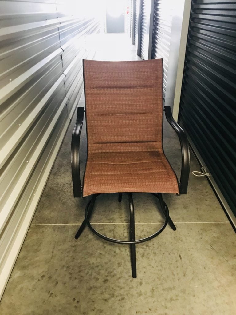 Outdoor patio table & 2 chairs. • Bar height patio table and two swivel chairs. Lightly used and in great condition.
