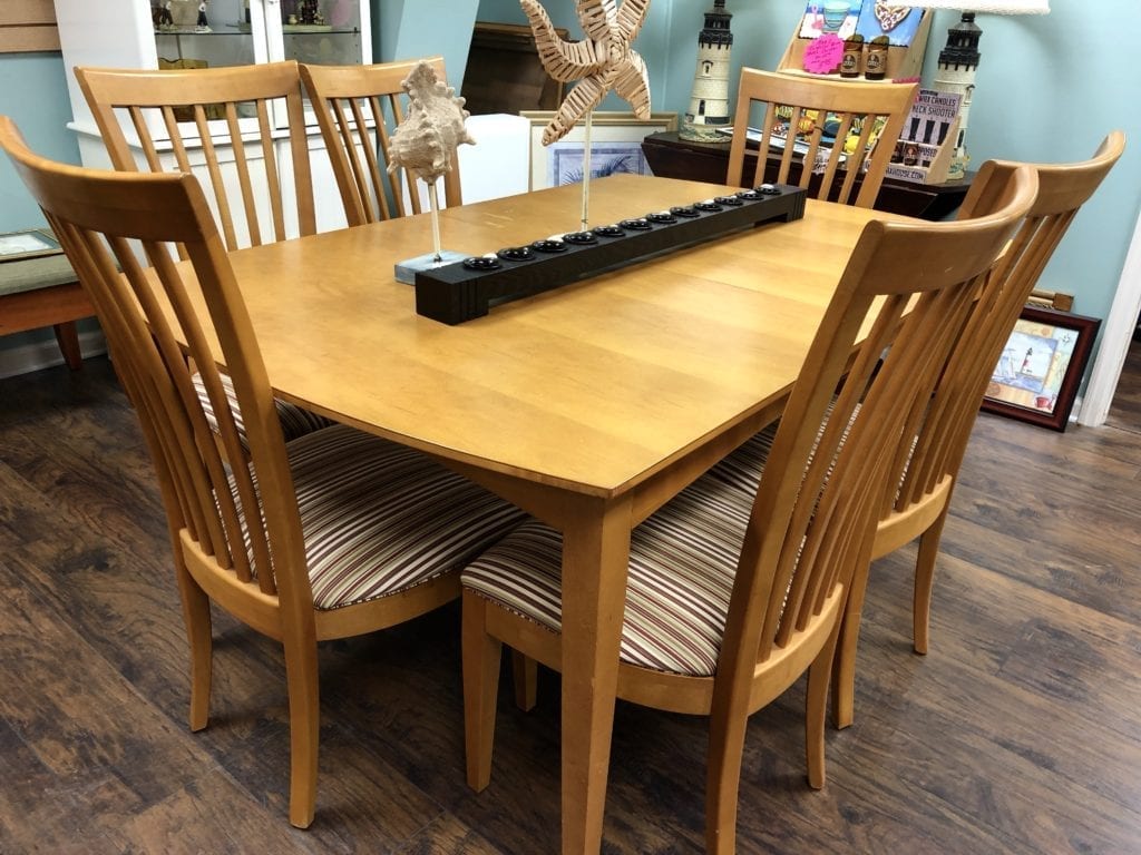 Wood Rectangle Tabe w/6 chairs • Nice wood rectangle dining table with 6 chairs. Chairs have striped fabric seats in a brown color scheme. 64” by 42” 2 20” leaves
