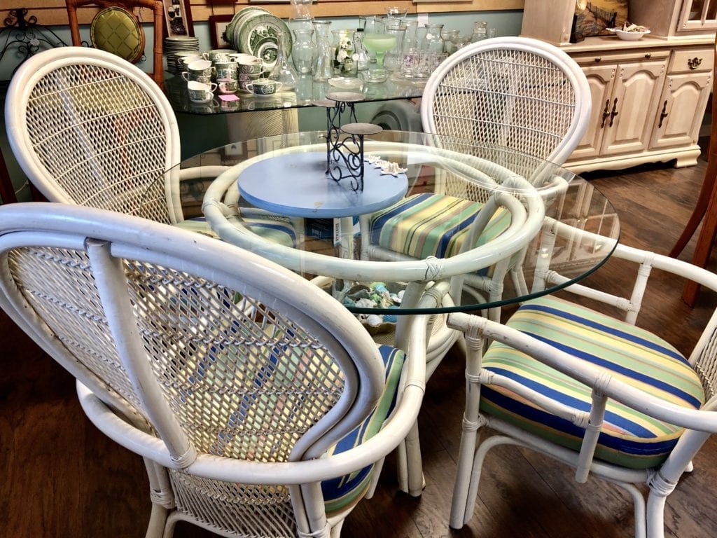 5 Piece White Rattan Dinette • White Rattan 5 piece dinette set. Glass table and striped fabric chairs. Perfect for that beach condo.
