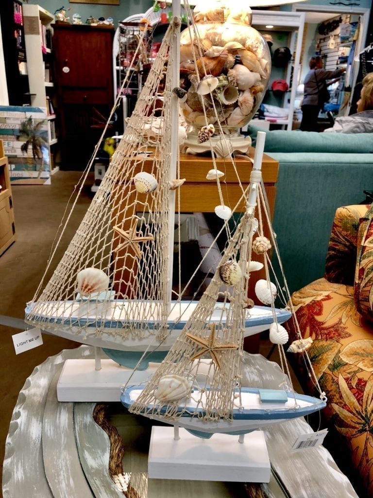 Decorative Sailboats with Netting • Unique wooden decorative sailboats with netting and shells. Perfect for that beach room or sunroom. Large is $35 and small sailboat is $15