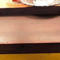 Leather and Wood Tray • This Leather and wood tray is large and perfect for use on an ottoman to store remotes, magazines, or to place drinks on while entertaining.