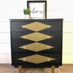 Vintage MCM Tallboy • This Vintage Mid Century Modern tallboy has been finished in Coal Black with bronze metallic accents. 
The upper three drawers feature a unique curved shape. 
Original hardware with a new brushed gold finish.  

Dimensions
(W)34” x (D)18.5” x (H)39”