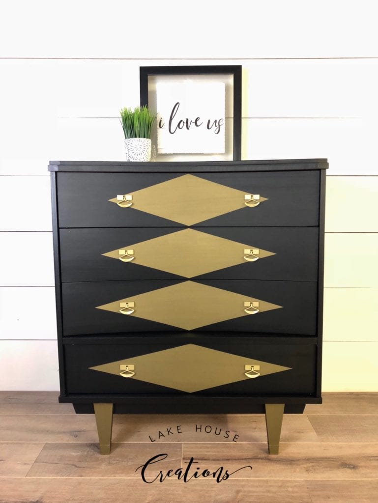 Vintage MCM Tallboy • This Vintage Mid Century Modern tallboy has been finished in Coal Black with bronze metallic accents. 
The upper three drawers feature a unique curved shape. 
Original hardware with a new brushed gold finish.  

Dimensions
(W)34” x (D)18.5” x (H)39”