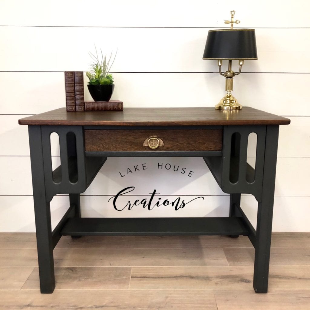 Mission Style Library Desk • Mission desk restyled in a dark grey with rustic top and drawer left with the natural wood grain and finished in a cappuccino stain. This unique piece is made from solid oak and features library shelves on each side.

Dimensions
(W)42" x (D)26" x (H)30.5"